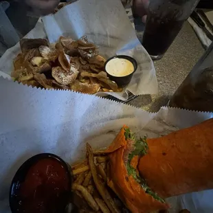 Cilantro wrap, cold fries and chips.