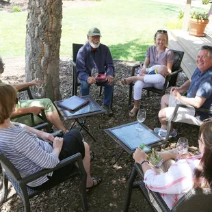 Enjoying wine under our cork oak tree!