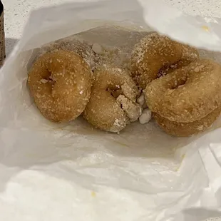 1/2 dozen powdered dinky donuts