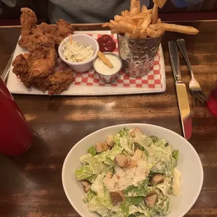 Chicken Tenders and Chips and Ceasar Classic Caesar Salad
