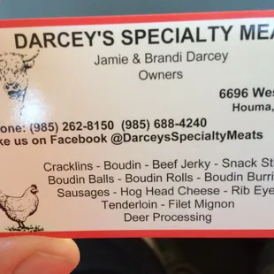 a person holding a business card