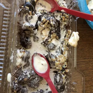 a container of ice cream with a spoon