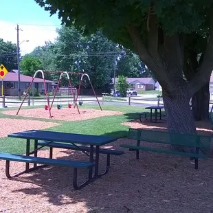 benches to enjoy your ice cream are in the shade at the park