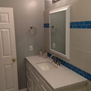 Quartz Top with Mitered Square Edge Detail and Rectangle Under Mount Sink.