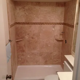 Travertine Shower with Deco Stripe