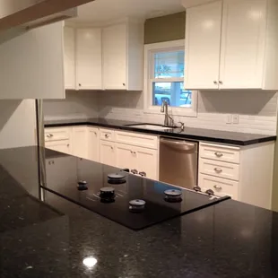 Kitchen remodel. View from living room where wall previously existed
