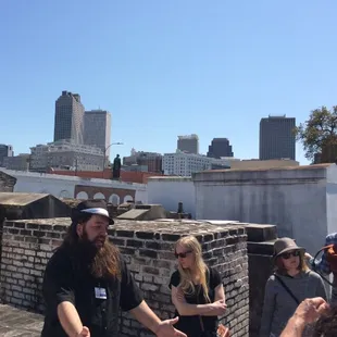 Thomas telling a story on my tour in Saint Louis Cemetery #1. Such a great tour!!