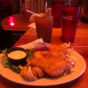 a plate of food and a drink