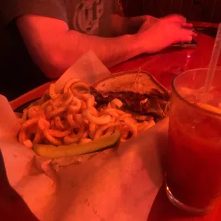 a sandwich and a drink on a table