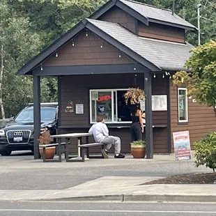 a man sitting on a bench