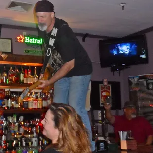 Mike Osborn beginning a  rockin' walk down the bar when the Michael Osborn Band  rocked the D.H. May 10, 2014.