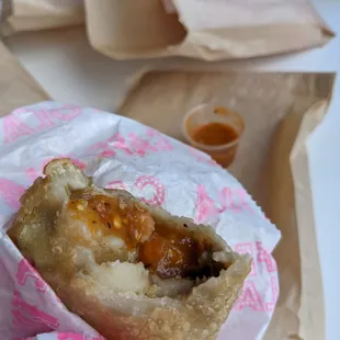 Steak and Potatoes Empanada with salsa cross-section view