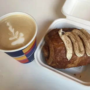 hot latte and cinnamon roll