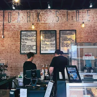 two people working at the counter