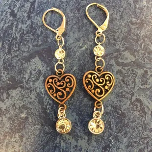 Custom requested copper hearts and colorless Swarovski crystals on silver lever backs.