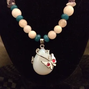 Beautiful Opal w/butterfly &amp; ruby Swarovski crystals added to the wings strung on silver chain with green &amp; peach opals &amp; amethyst chips.