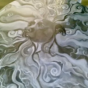 A painting of our dog, Ruby Soho, on the coffee table