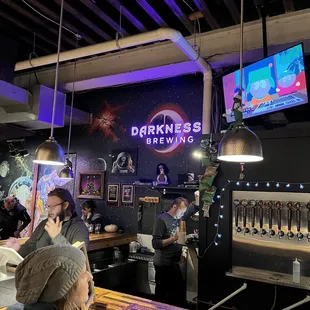 people sitting at the bar