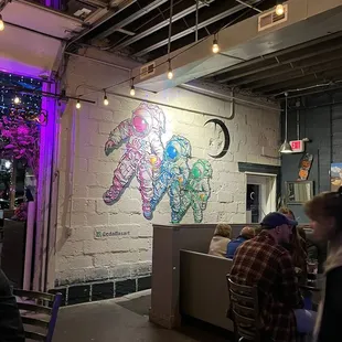 people sitting at a bar