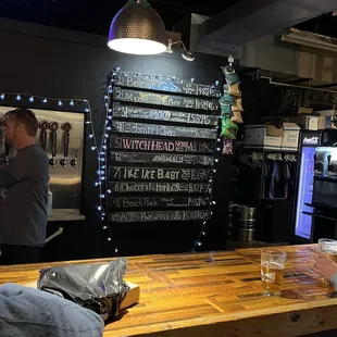 a man standing at the bar