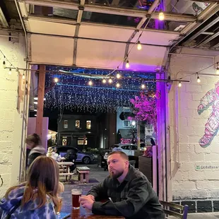 a man and a woman sitting at a table