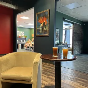 a glass of orange juice on a table