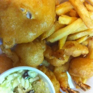 The product - fried deviled crab, butterfly shrimp, Cole slaw, fries