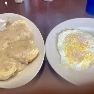 2 biscuits with sausage gravy ( where is the sausage?) and 2 eggs supposed to be over easy.
