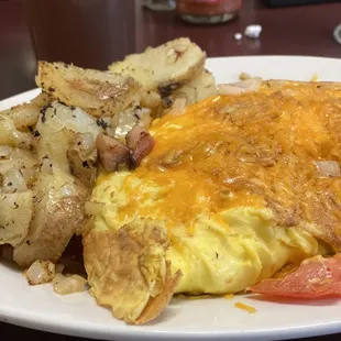 an omelet and potatoes