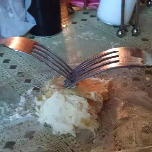 Dueling forks ... Last bite of kreme ....