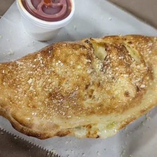 a half eaten pizza in a box