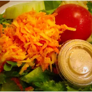 This side salad has a nice shredded coconut as the topping! :)