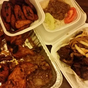 Poulet Braise (grilled chicken legs), Dibi (grilled lamb), white rice with gravy, and plantains