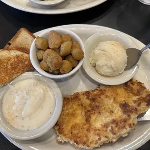 Chicken Fried Chicken with Mashed Potatoes and Fried Okra and toast.