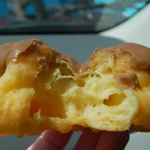 One bite into the maple French cruller.