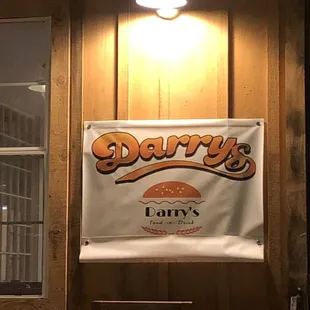 ows a sign for darry&apos;s