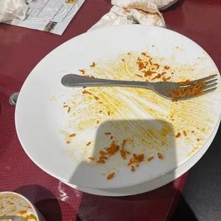 a dirty plate of food