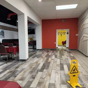 a caution sign on the floor