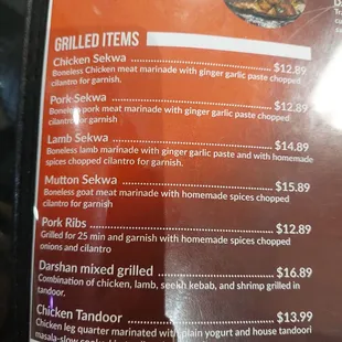 Grilled items served on sizzling skillet