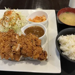 Chicken katsu plate, with miso soup, white rice, ginger-dressed cabbage salad, radish kimchi, katsu sauce and of course the katsu.