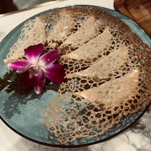 a flower on a plate