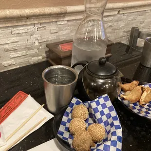 Water, Hot Tea, Sesame Balls, Gyozas
