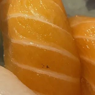 Black marks inside of fish, MOST pieces look like this. Smells.