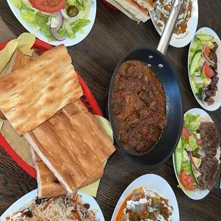 Qabuli rice (carrots and raisins), mantu, ashak, chaplee kabob, tikka kabob, side of salad