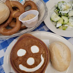 Munich Bread Basket, Cucumber Salad and Goulash with Hot Roll