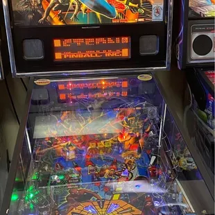 a spider - man pinball machine