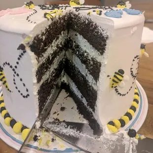 Gender Reveal chocolate cake with blueberry mousse frosting
