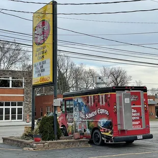 The sign and the food truck