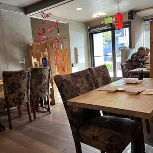 Back section with booths with tables for 4