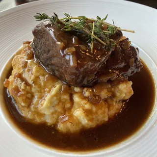 Braised Beef Short Rib & Grits with a Demi Glaze on top